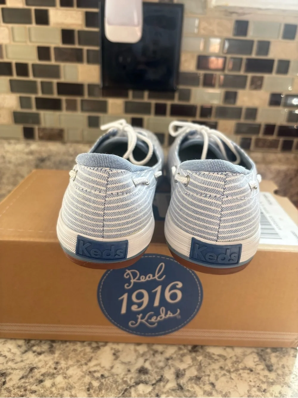 Keds lace up boat style shoe